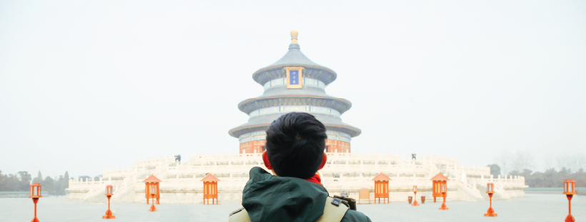 Man in China looking to Chineese Building